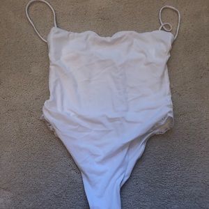 By Cassandra white one piece w lace detail